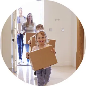 A family moving into their new furnished rental property after the landlord received landlord advice