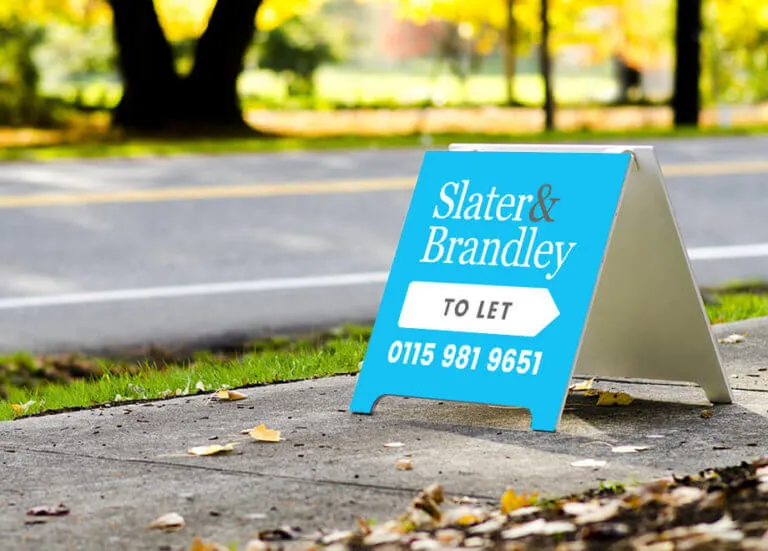 Slater and brandley to let sign outside a buy to let full managed property